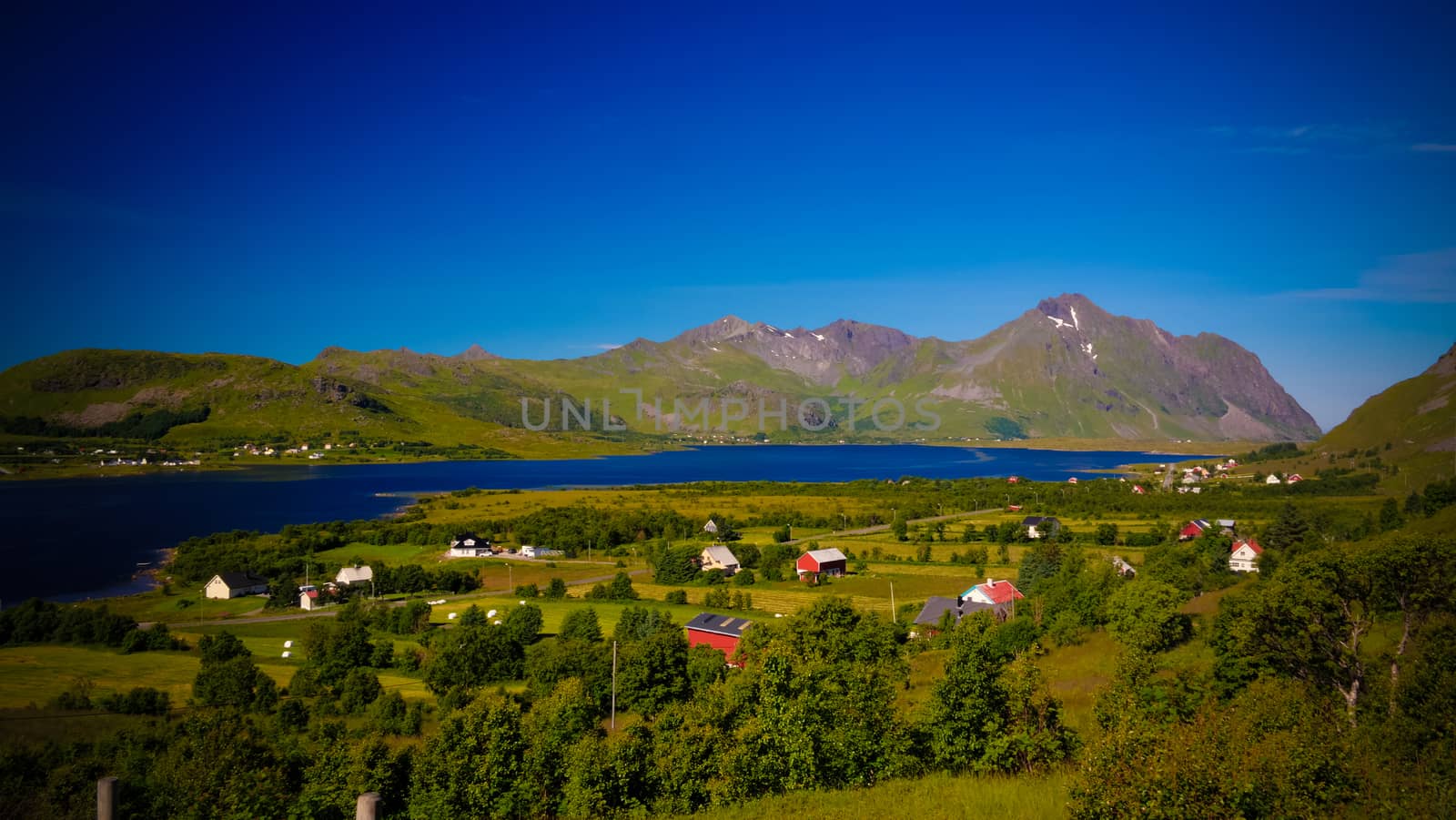 Panoramic view to Bostad village and Borgpollan fjord from Torvdalshalsen viewpoint at Vestvagoy Island, Lofoten, Norway by homocosmicos