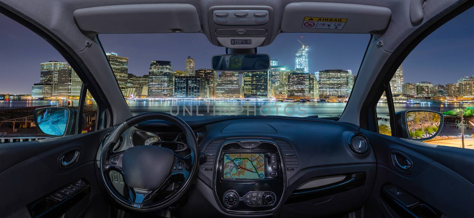 Car windshield with view of Manhattan skyline, New York, USA by marcorubino