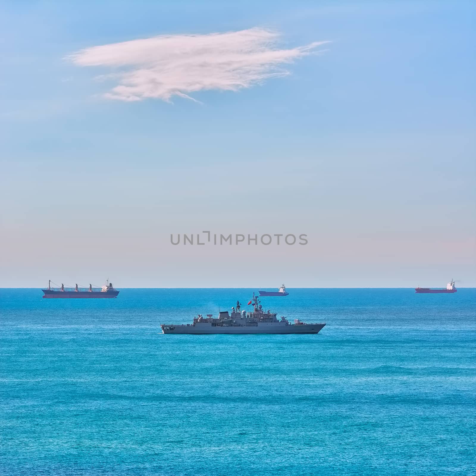Military Frigate near Cargo Ships  in the Black Sea