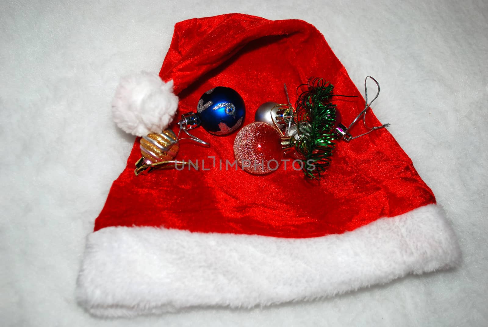 red hat with a Christmas toy by mayboro