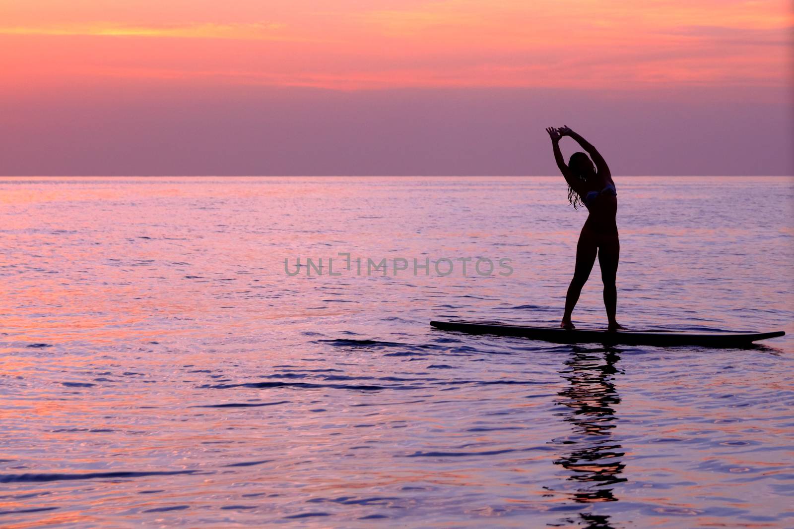 Woman doing yoga asanas by Anna_Omelchenko