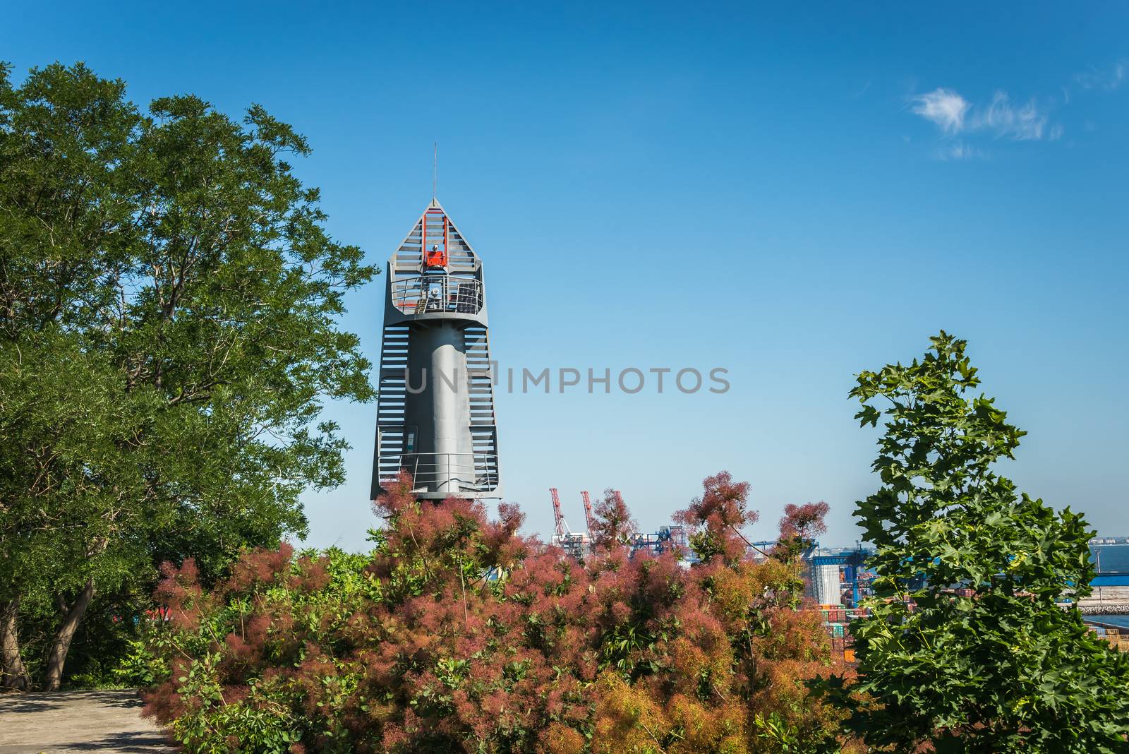 Old lighthouse in the cargo port and container terminal in Odessa, Ukraine