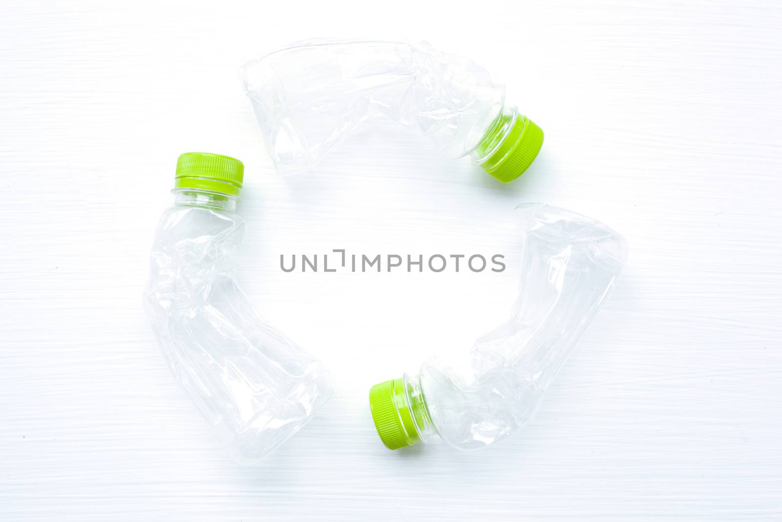 Empty plastic water bottle for recycling isolated on over white background.