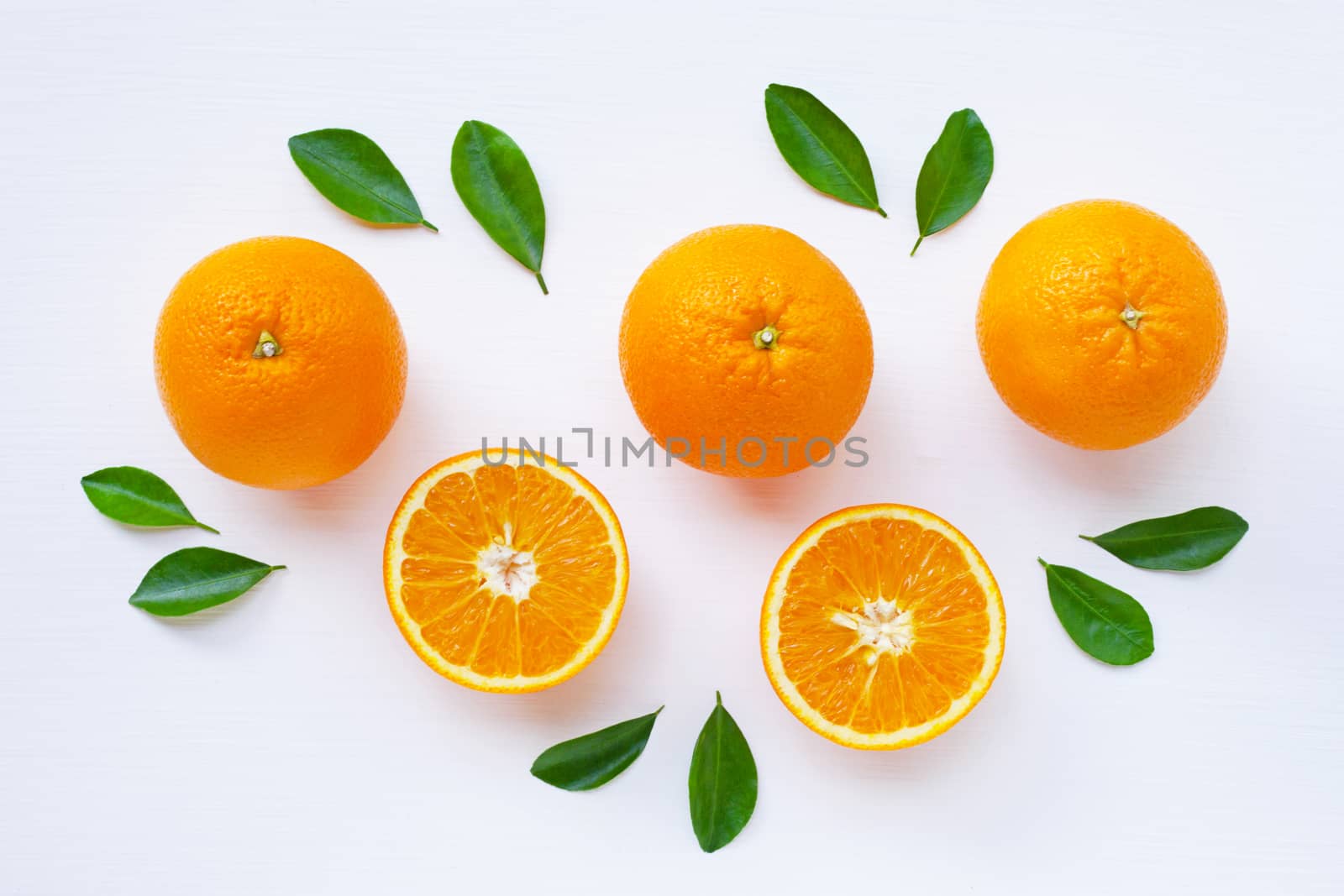Fresh orange citrus fruit isolated on white background.  Top view