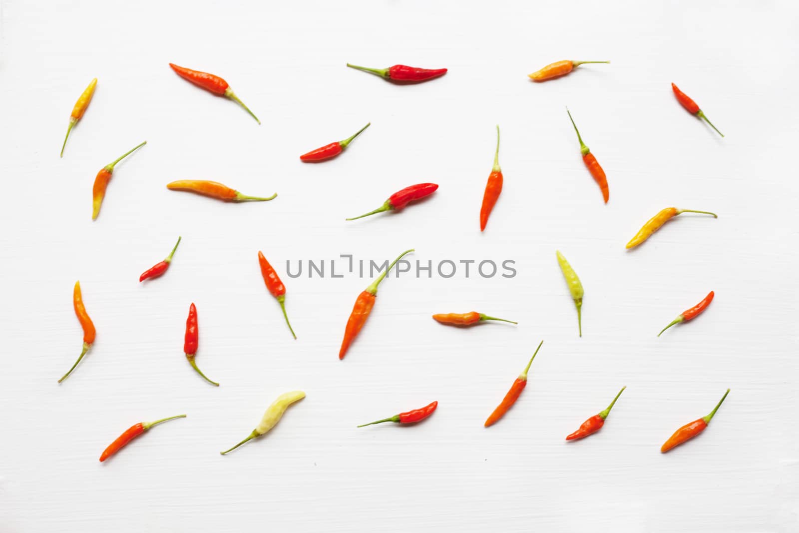 Chili peppers on white.