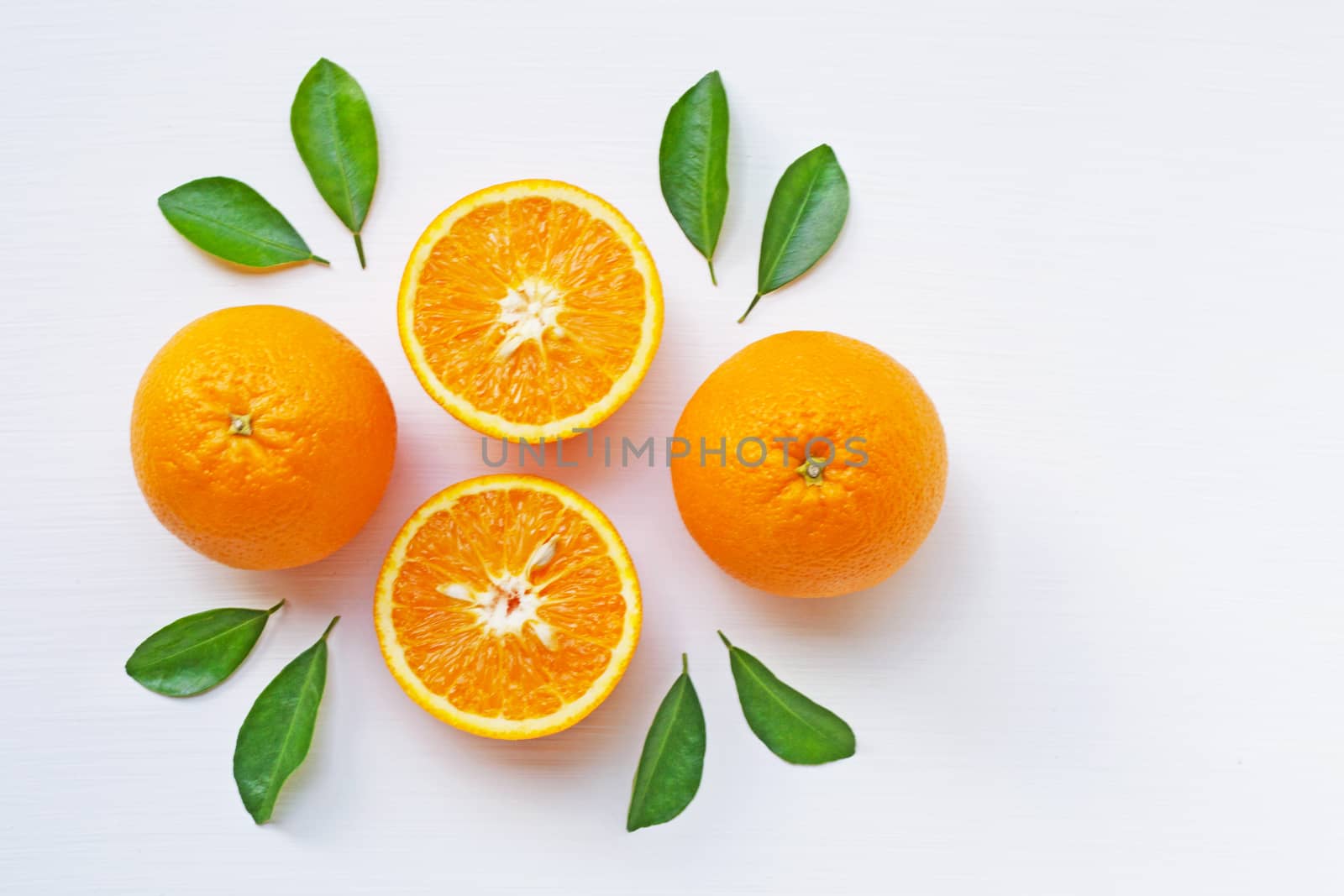 Fresh orange citrus fruit isolated on white background.  Top view