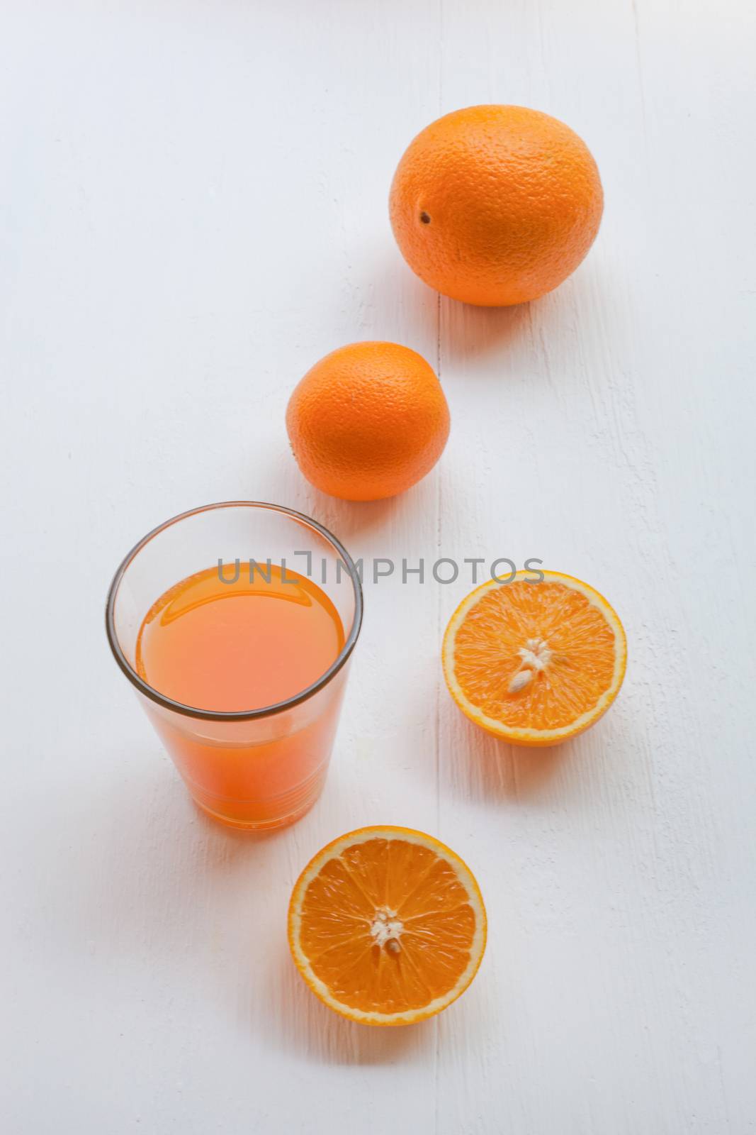 Fresh orange juice on white, Healthy vitamin drink.