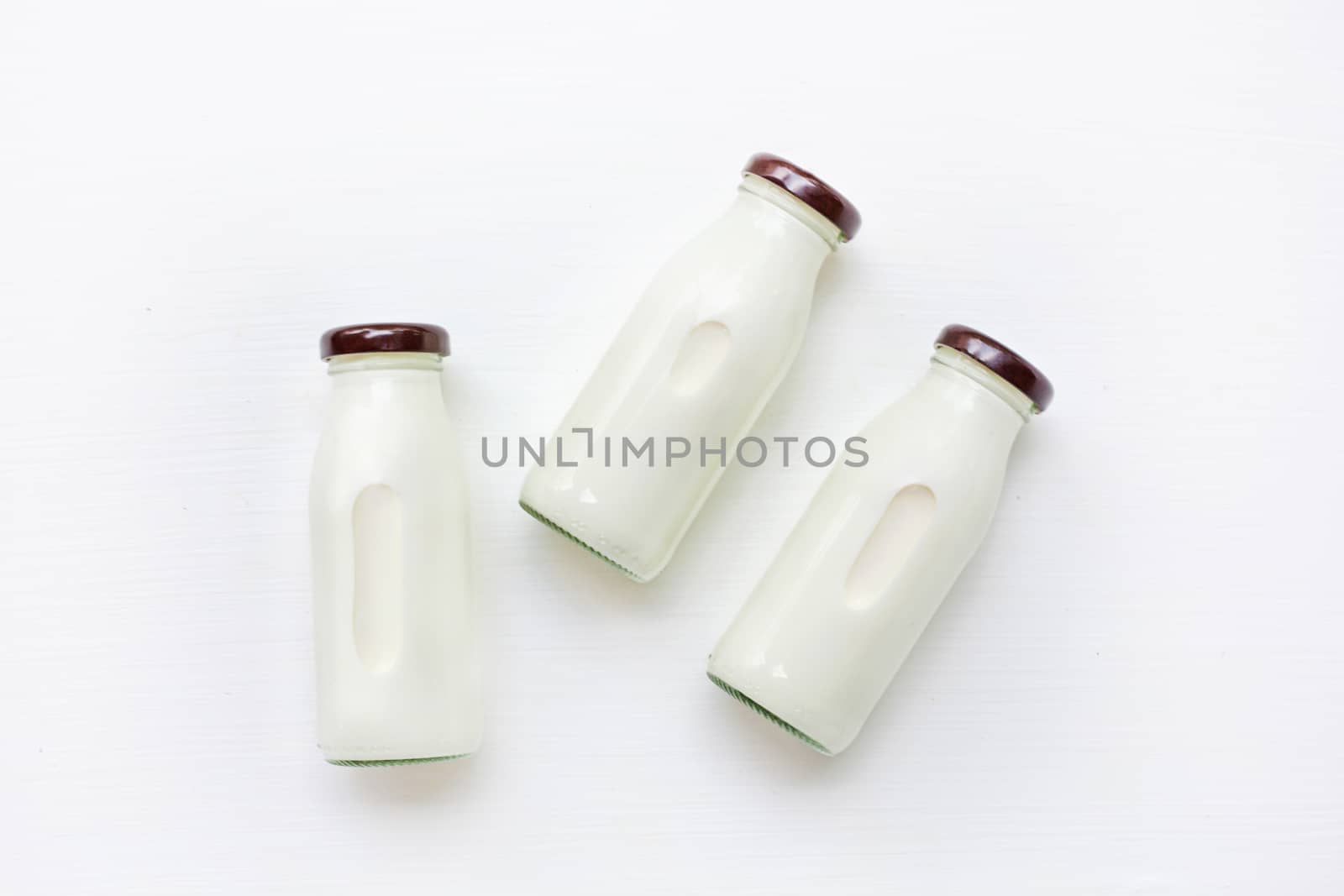 milk bottle on white background. Top view