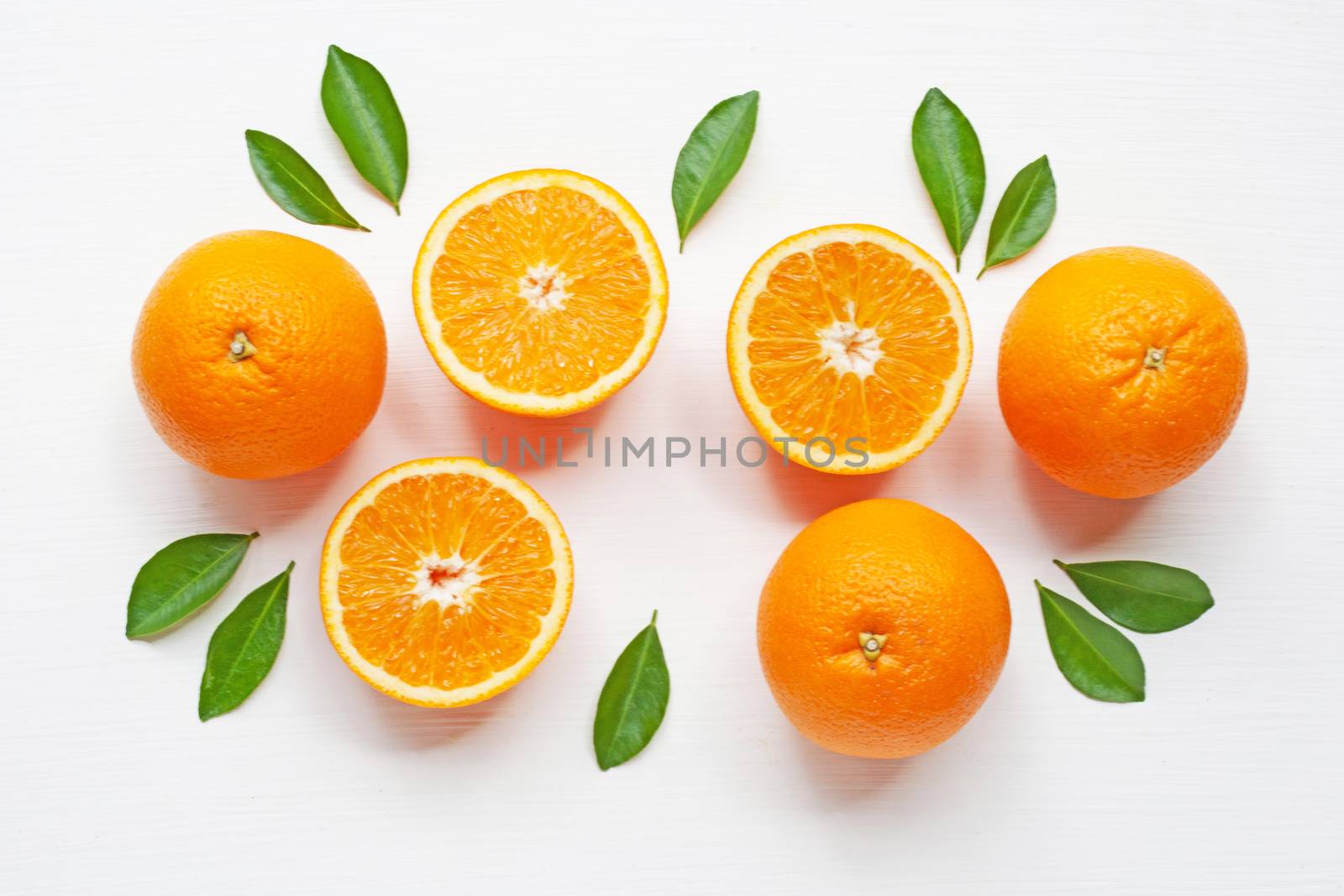 Fresh orange citrus fruit on white background. Top view
