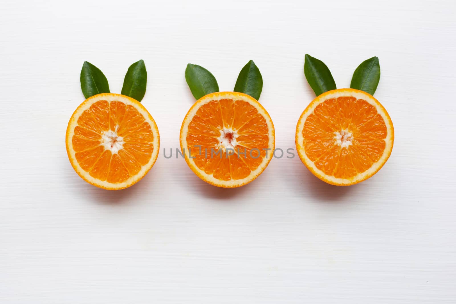Fresh orange citrus fruit isolated on white background.