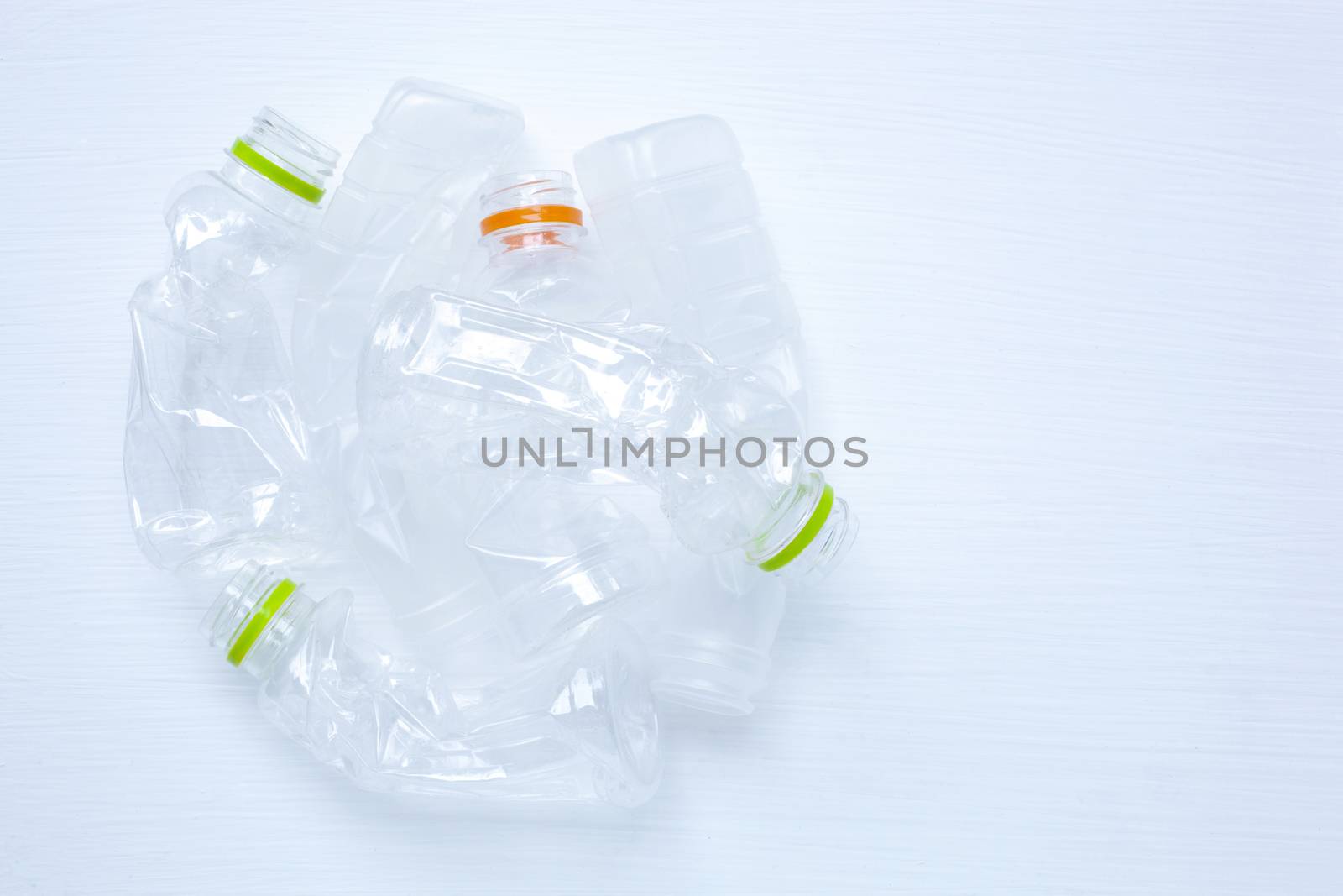Empty plastic water bottle for recycling isolated on over white background.