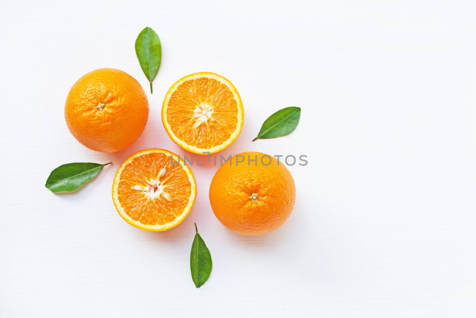 Fresh orange citrus fruit on white background. Top view