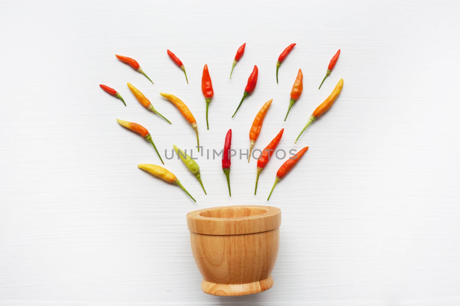 Chili peppers on white.