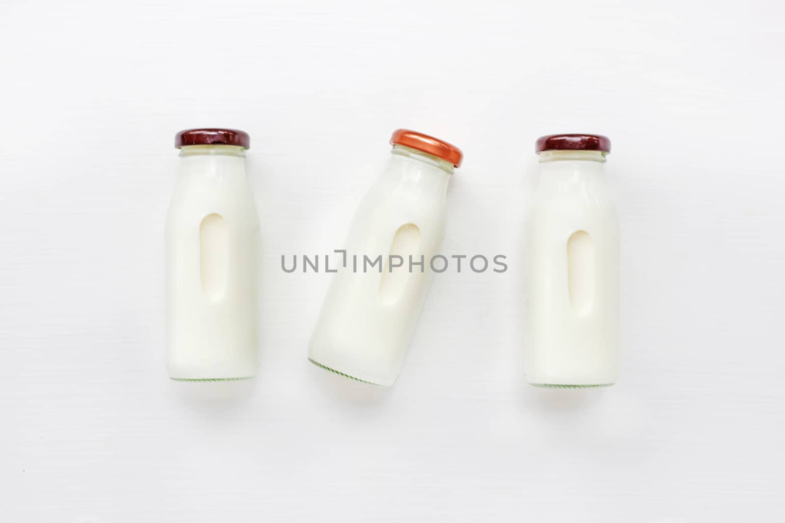 milk bottle on white background. Top view