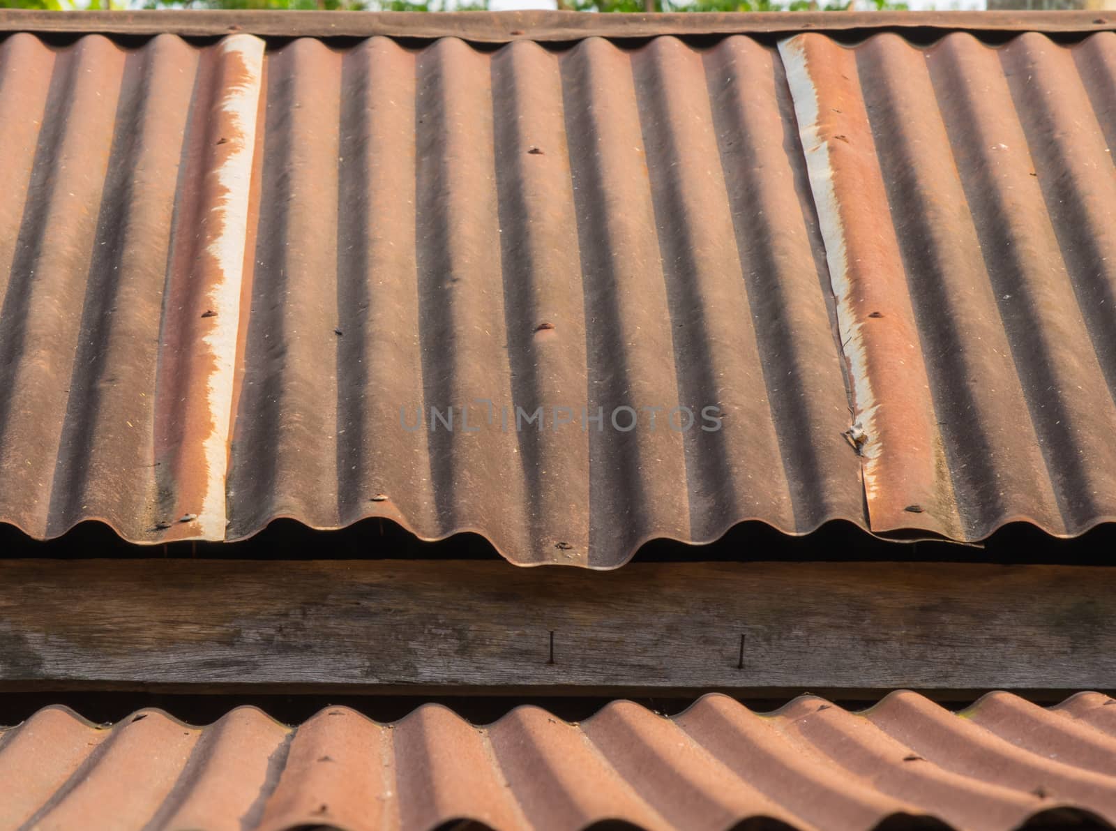 A Roof rusty corrugated iron metal texture by peerapixs