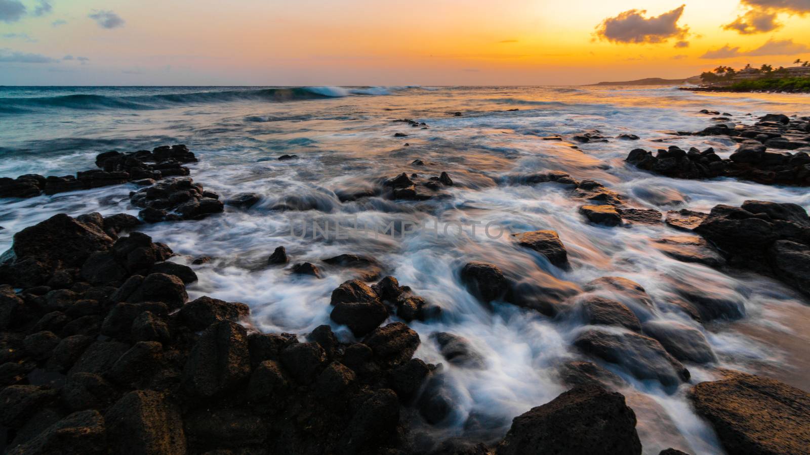 A dramatic sunset looking over the Pacific Ocean. Kauai, Hawaii.