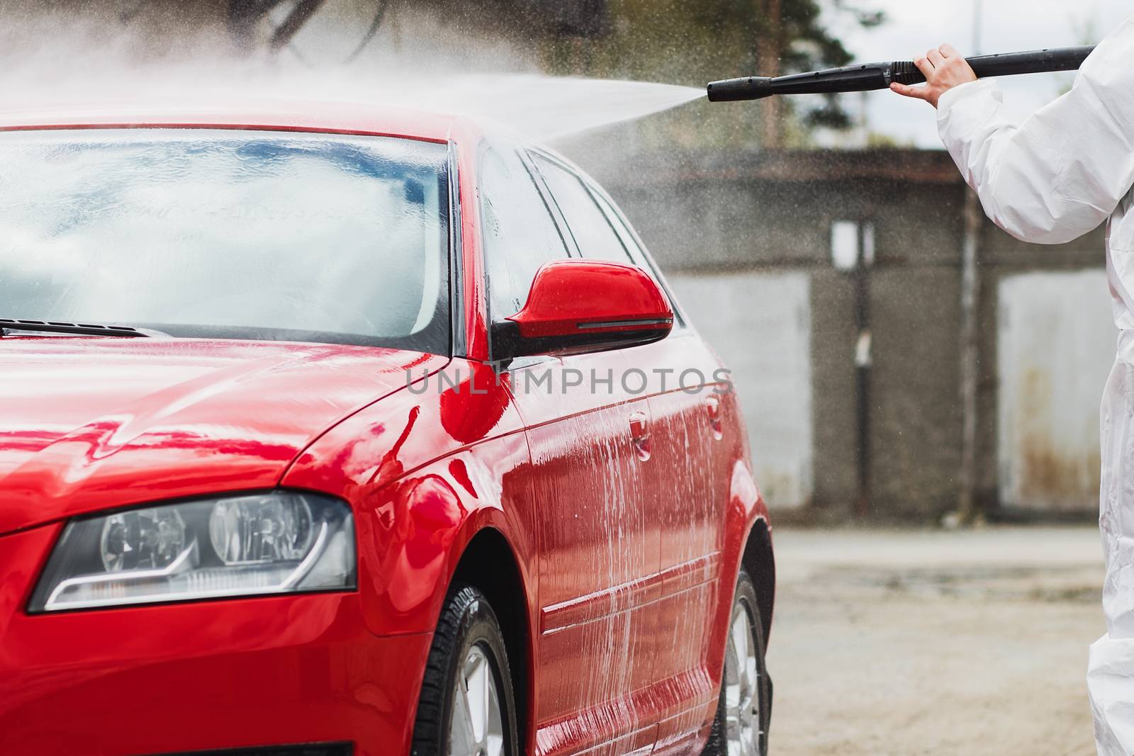 Summer Car Washing. Cleaning Car Using High Pressure Water by 3KStudio