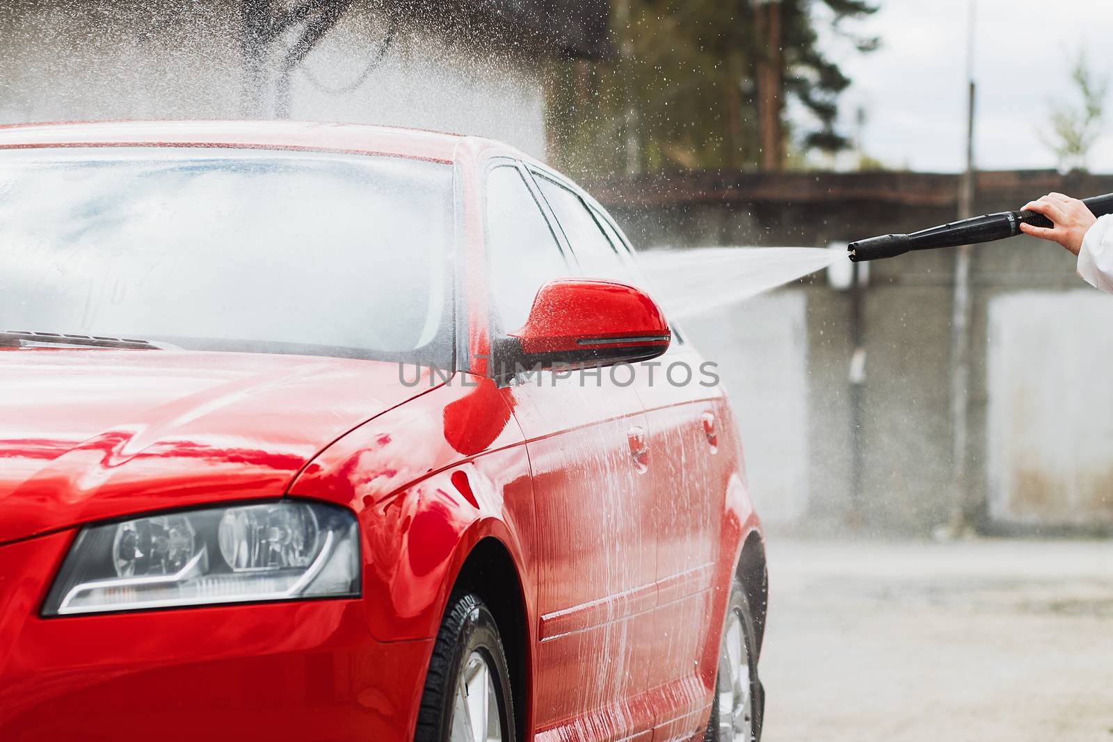 Summer Car Washing. Cleaning Car Using High Pressure Water by 3KStudio