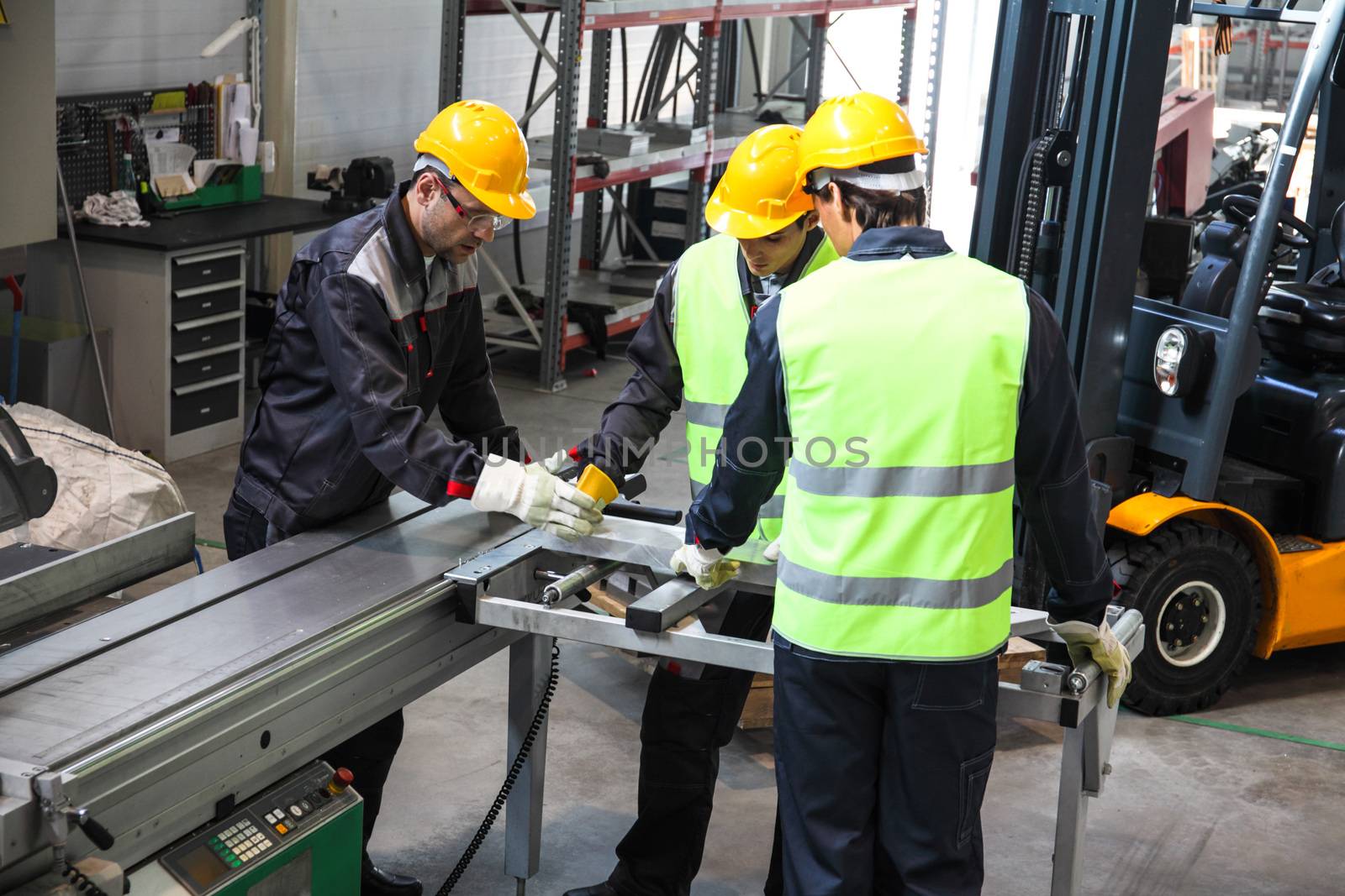 CNC machine shop with lathes, technicians and workers
