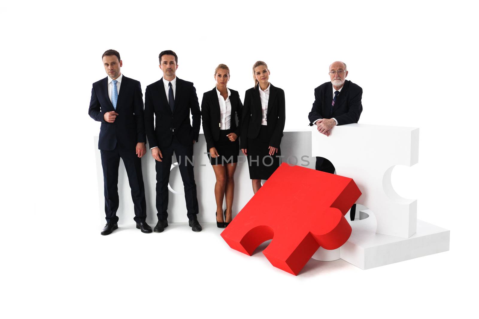 Business team portrait and big puzzle isolated on white background