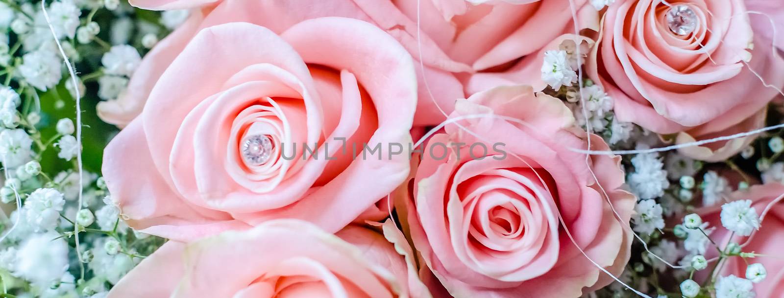 Bouquet of pink roses with small briliants. Romantic concept for Valentine's Day