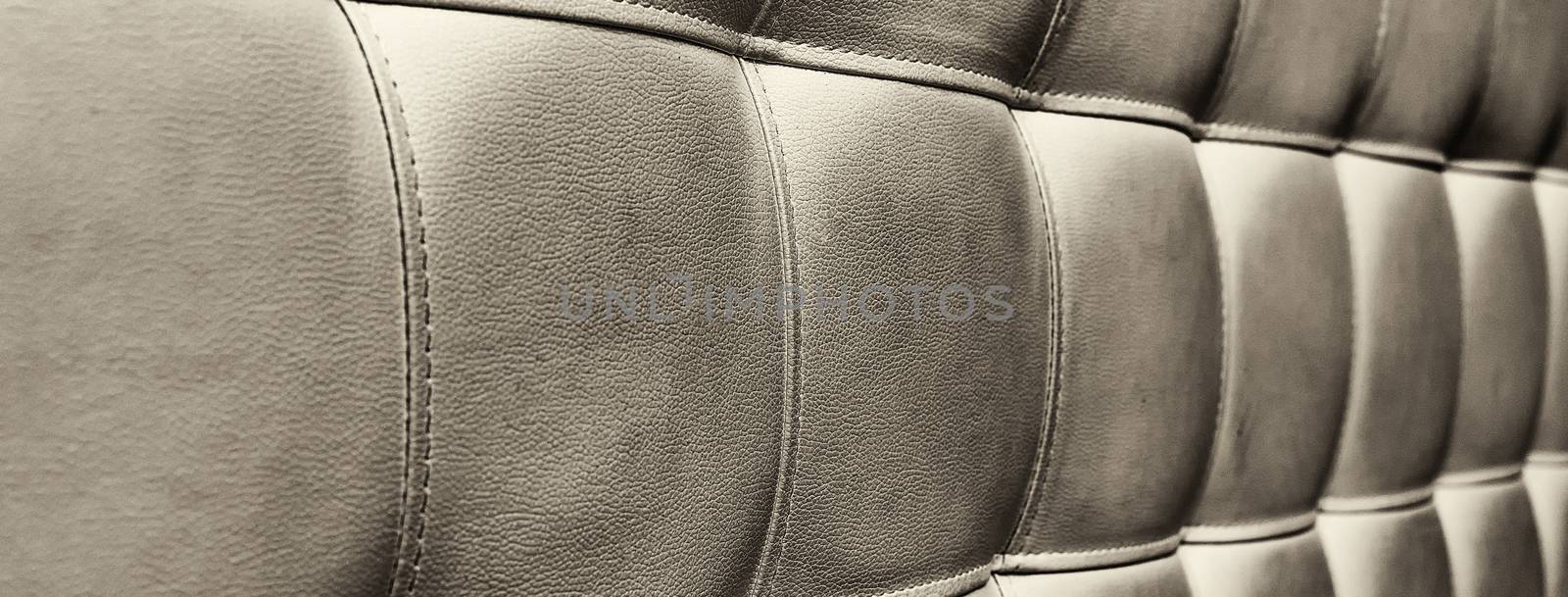 Tufted grey leather headboard texture, used for background