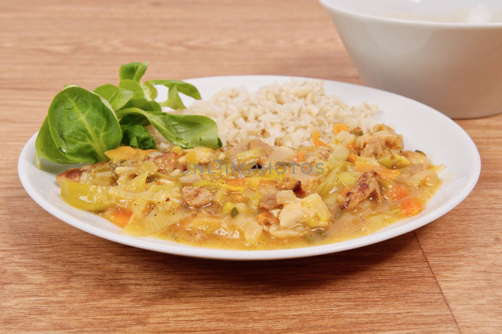 China of soy noodles and leek with rice on a white background