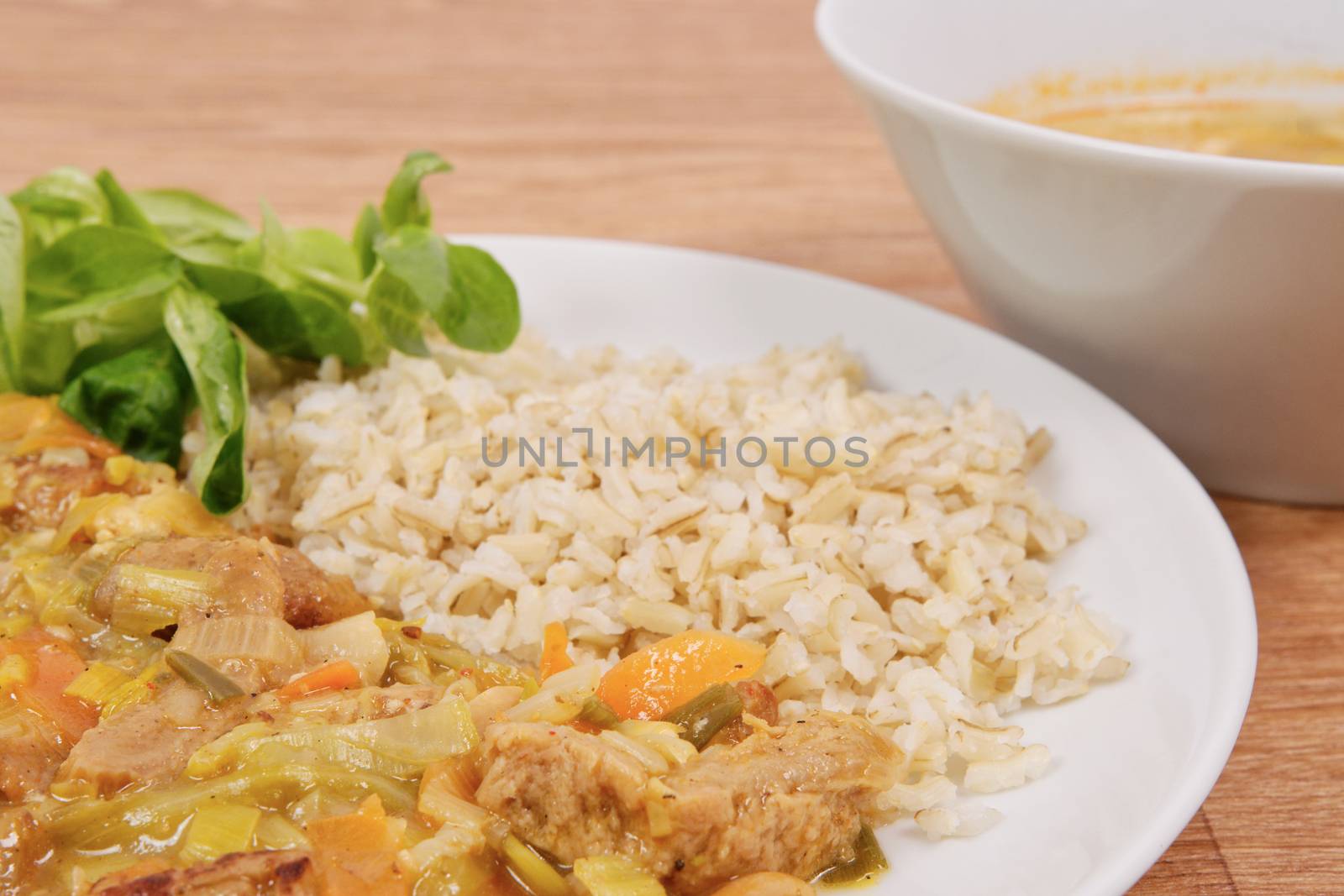 China of soy noodles and leek with rice on a white background
