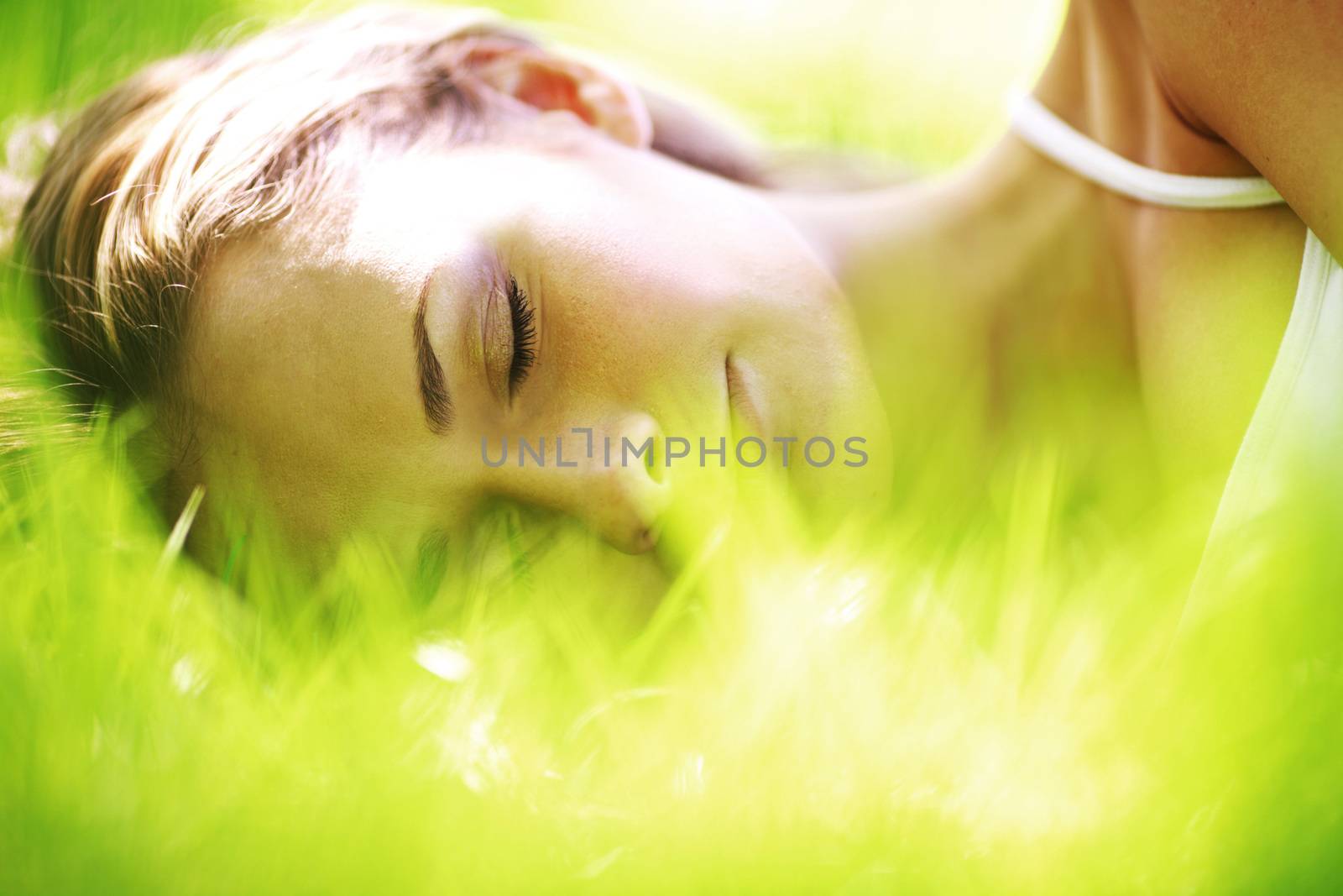 woman sleep on grass by Yellowj