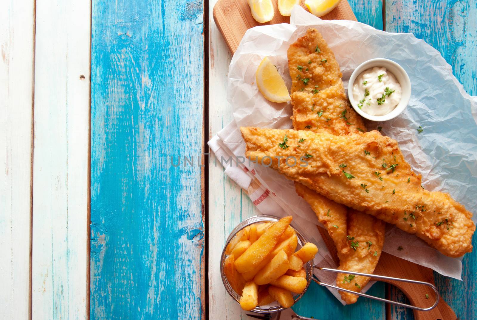Traditional battered fried fish with chips