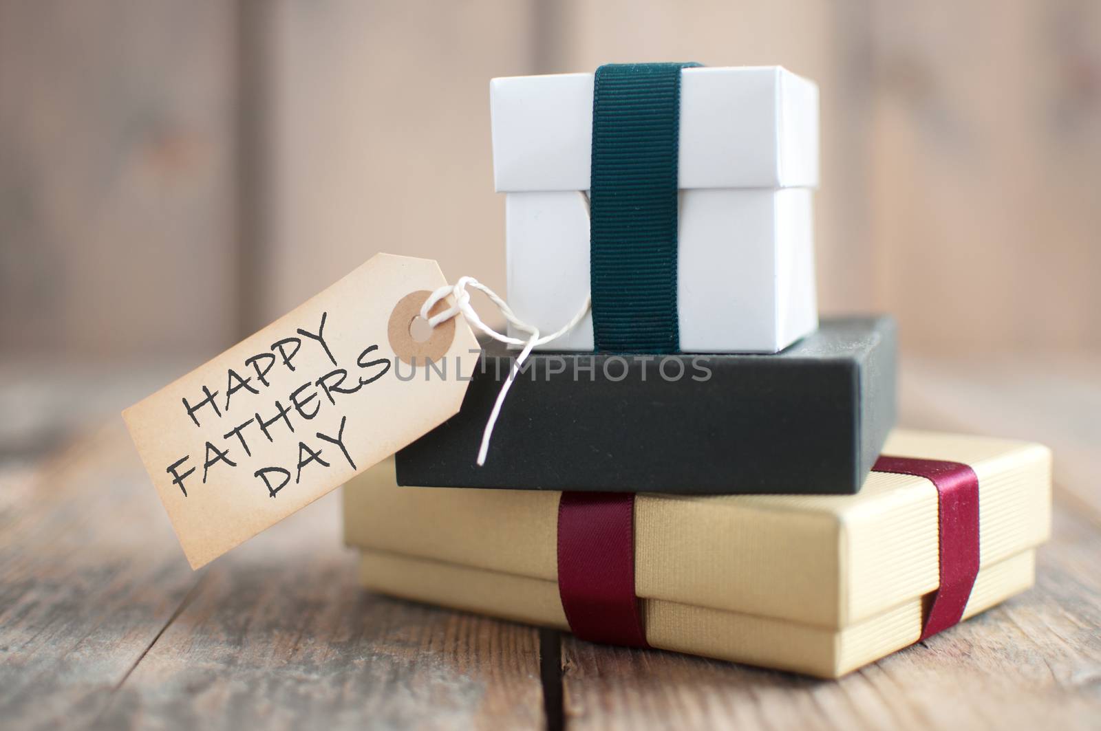 Happy fathers day label attached to presents