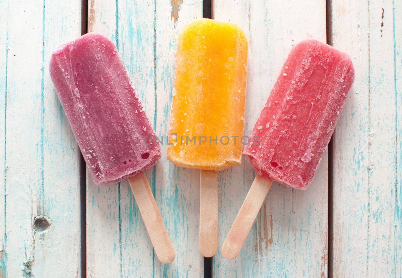 Assorted flavored ice popsicles