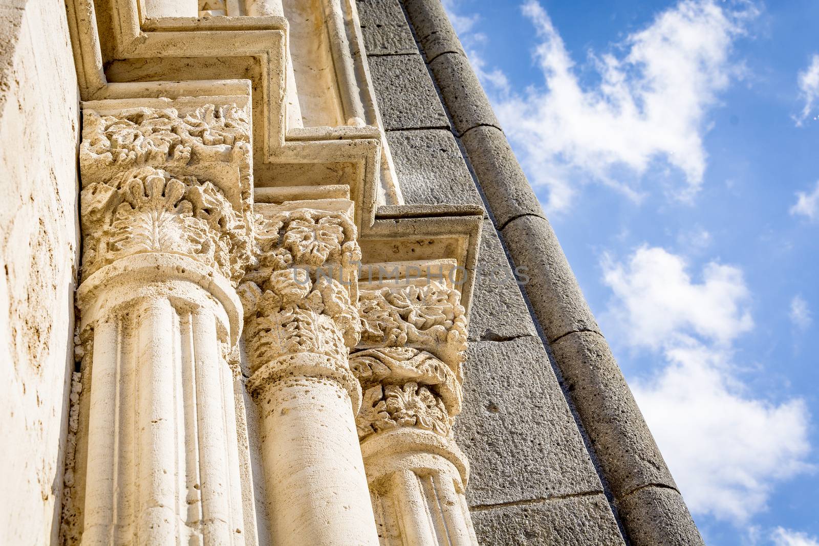 three ancient columns with capitals of the Corinthian order