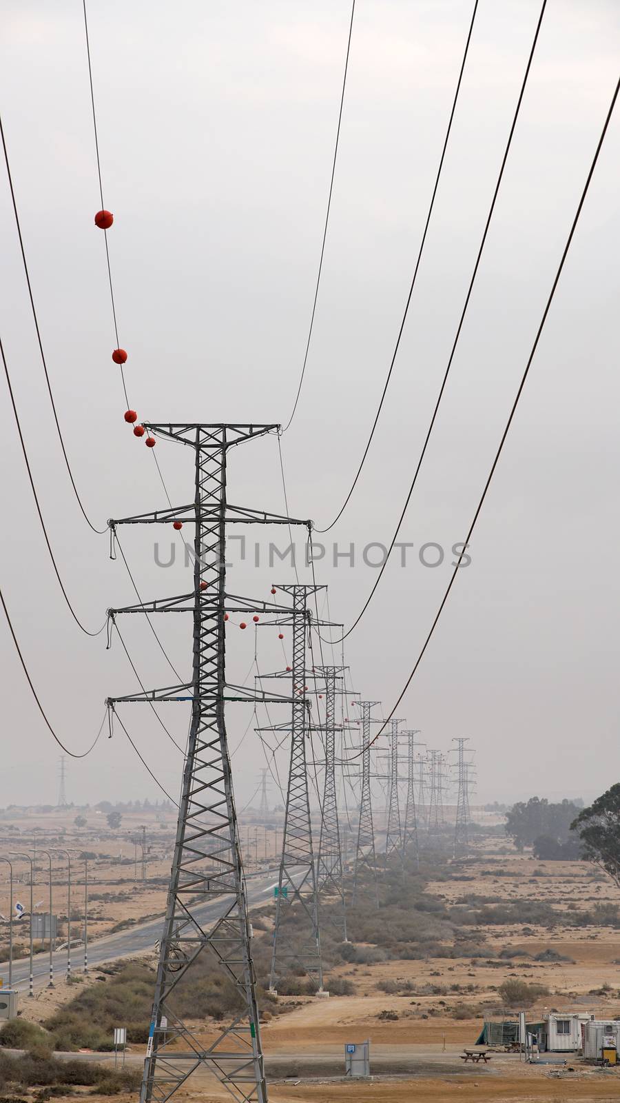 electric poles in the desert by MegaArt