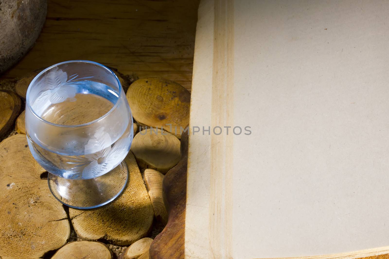 Glass of vodka and an ancient book by VIPDesignUSA