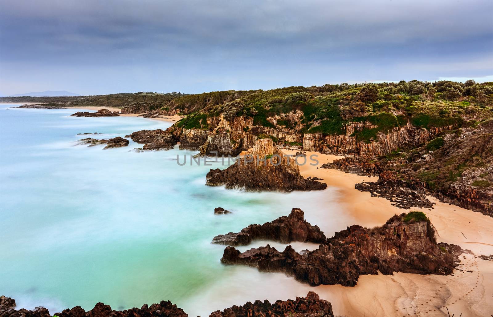 Views over the coastline with rising sea stacks at Bingie NSW Australia