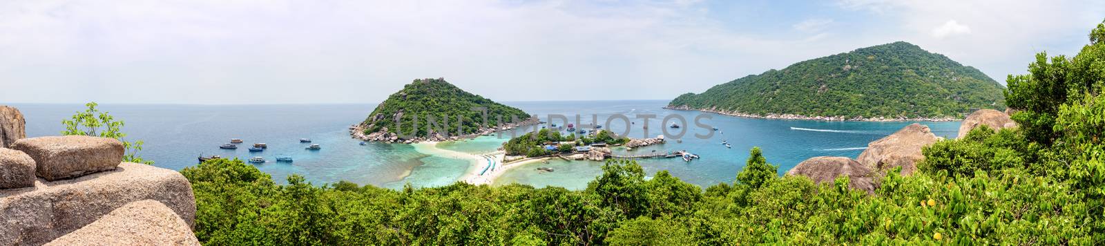 Panorama high angle view beautiful nature landscape sea beach and pier for boat trip at Koh Nang Yuan Island during summer is a famous tourist attraction in the Gulf of Thailand, Surat Thani, Thailand