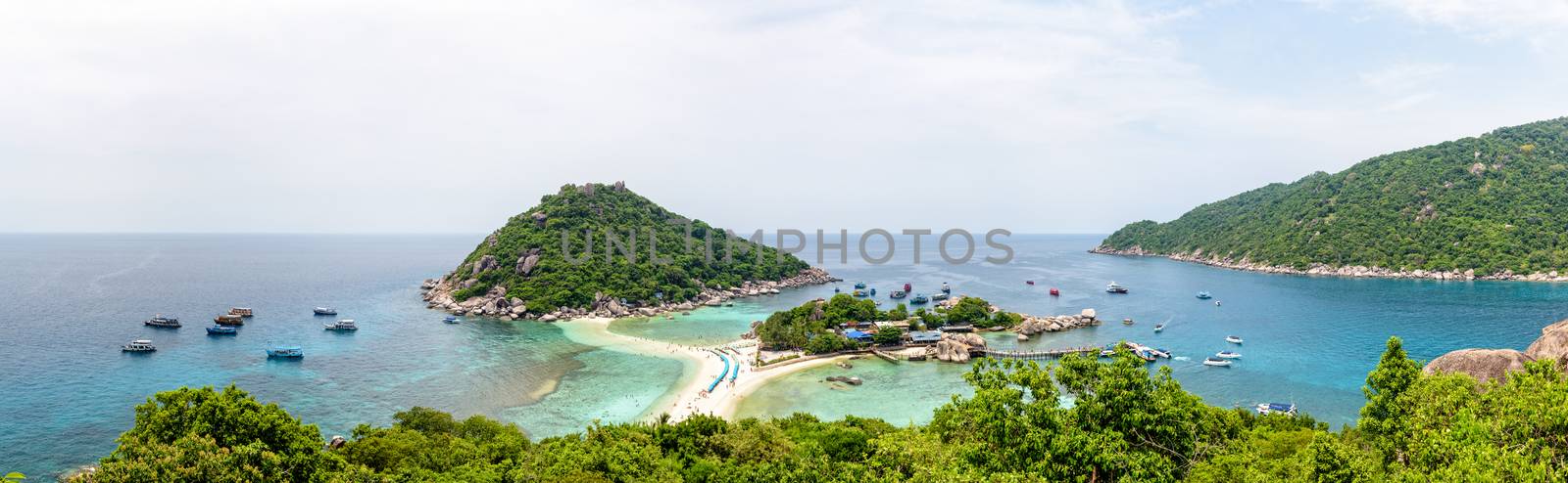Panorama high angle view beautiful nature landscape sea beach and pier for boat trip at Koh Nang Yuan Island during summer is a famous tourist attraction in the Gulf of Thailand, Surat Thani, Thailand