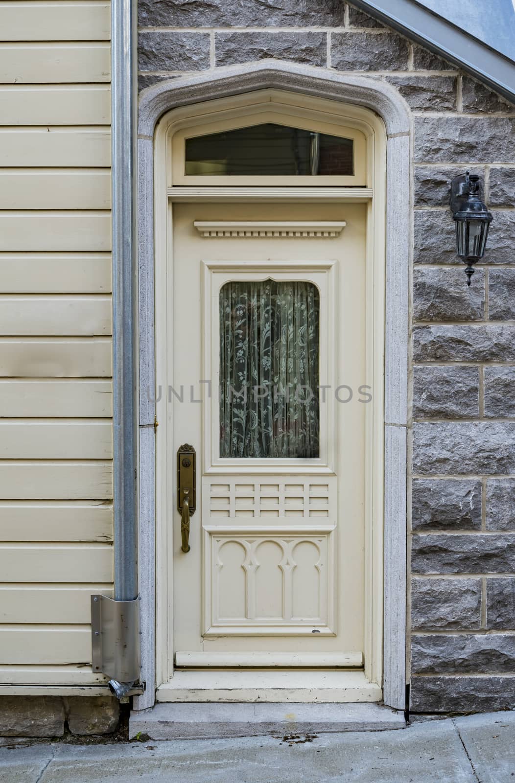 Wooden door entrance in the historical district in Quebec City, Canada