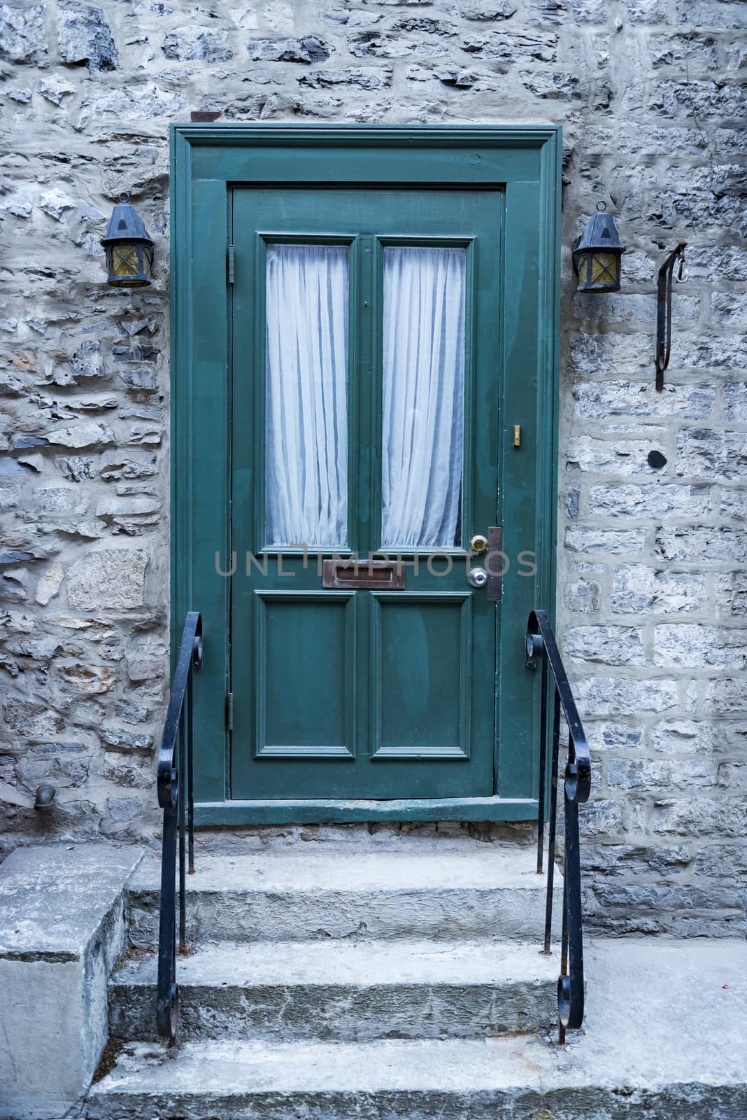 Wooden door entrance in the historical district in Quebec City, Canada