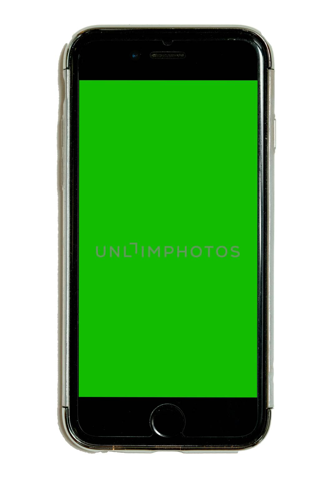 Smart phone in protective case with green chroma key touchscreen, isolated on white background, cell, mobile phone, adaptable for mockups and design, large resolution