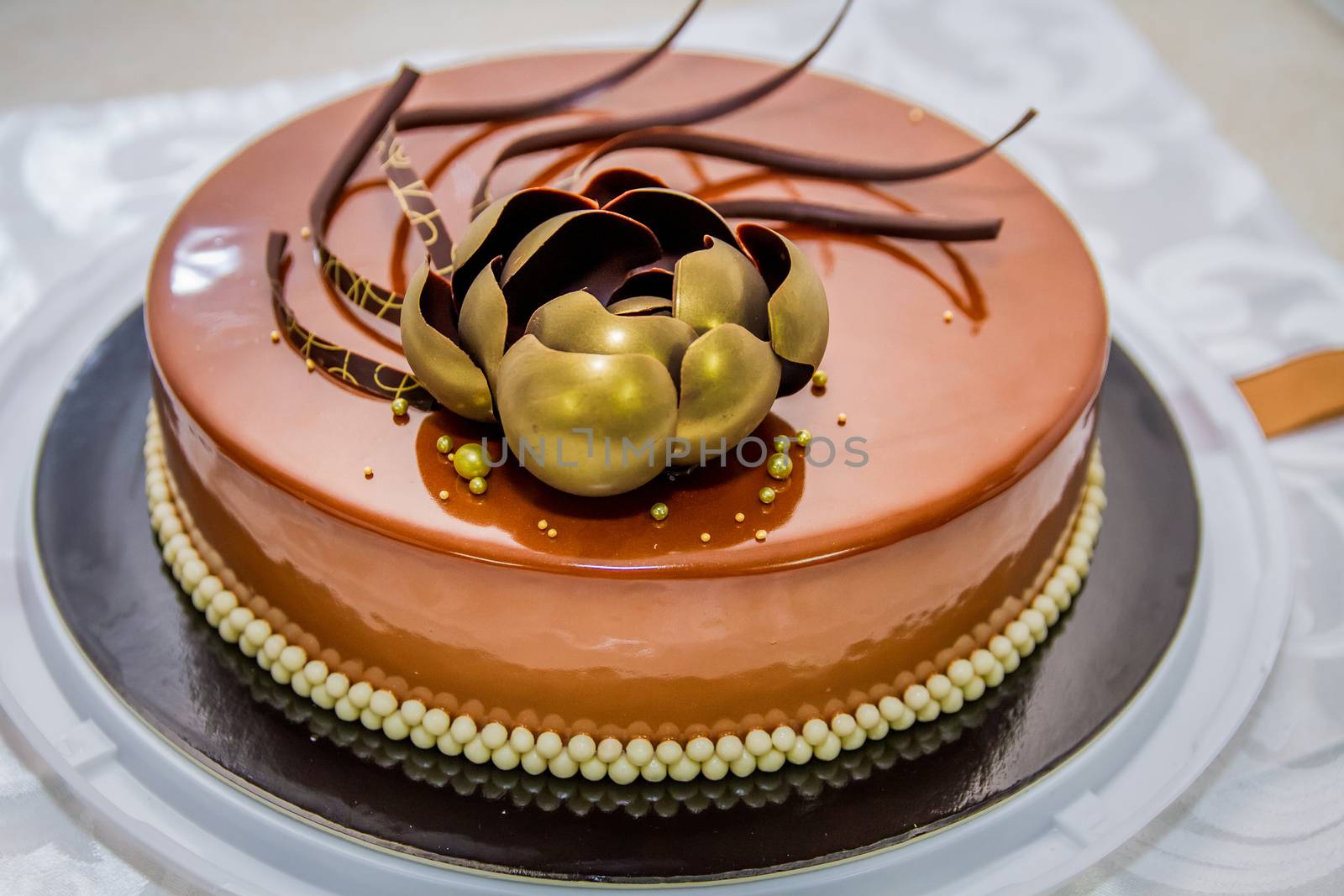 Golden chocolate cake with flower and pearls by Angel_a