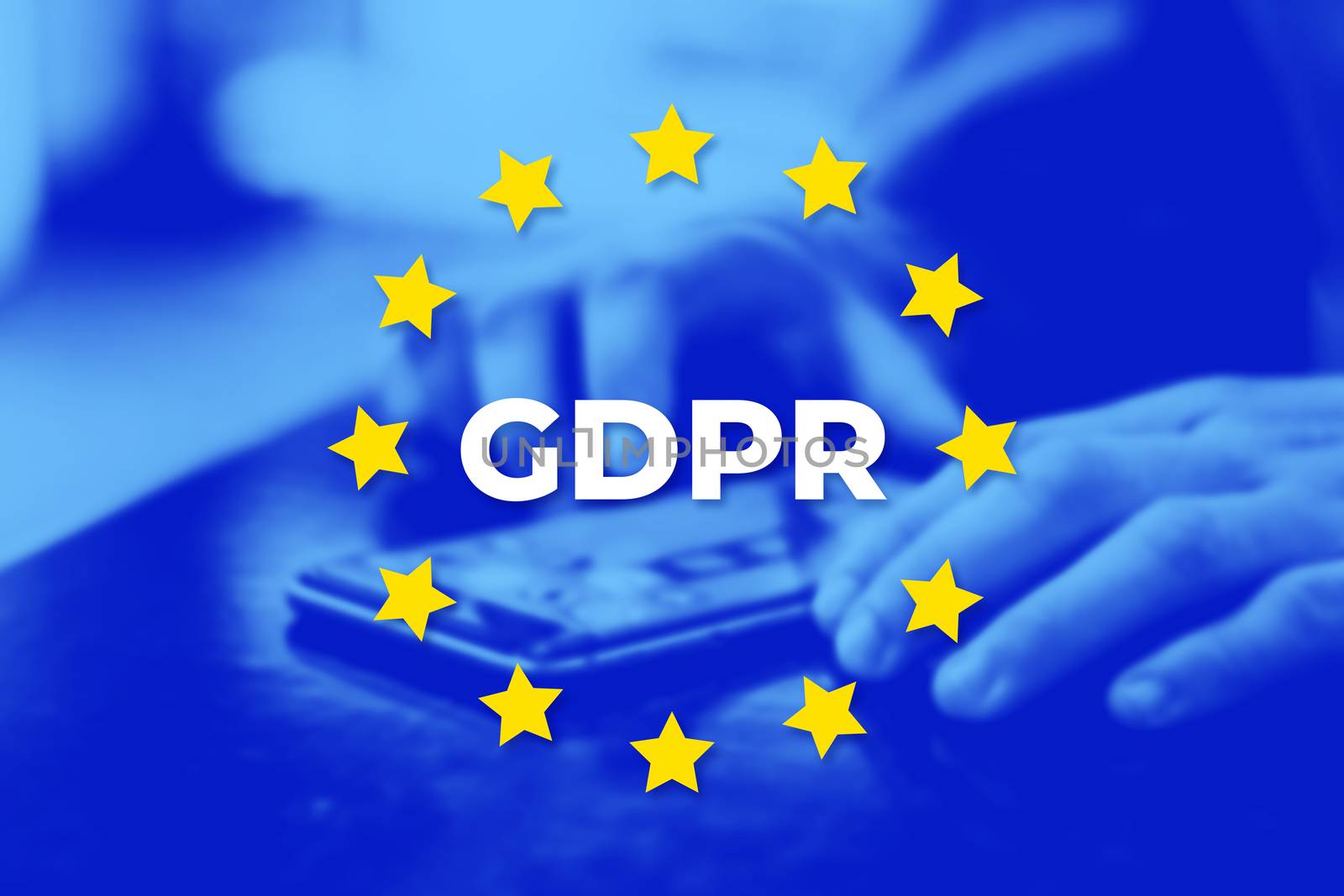 GDPR - General Data Protection Regulation. EU flag with blue photo background. User protects their data on a mobile phone