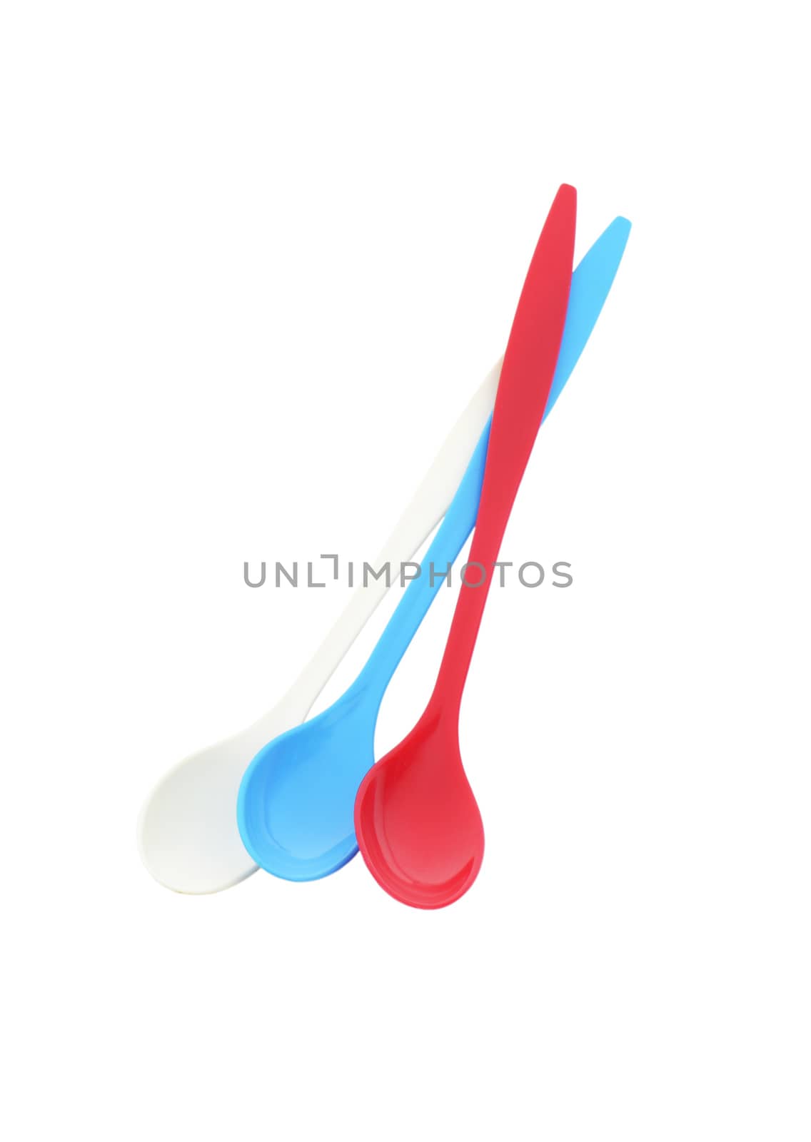 Three long plastic spoons by Digifoodstock