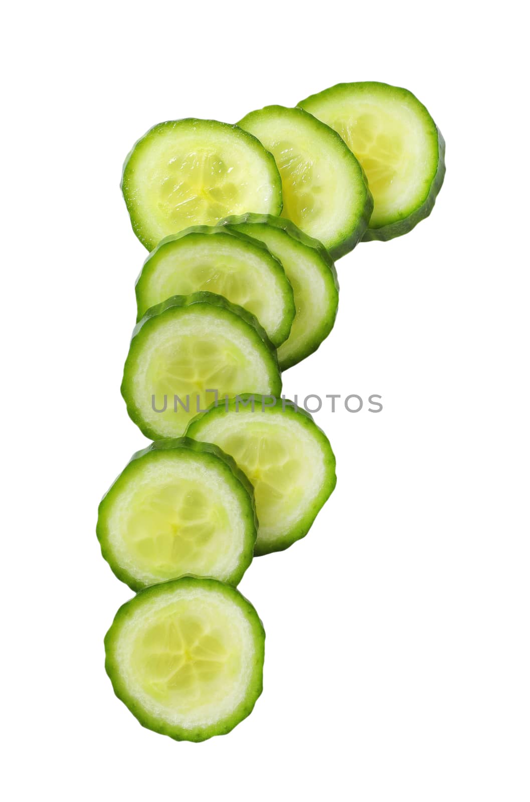 slices of green cucumber on white background