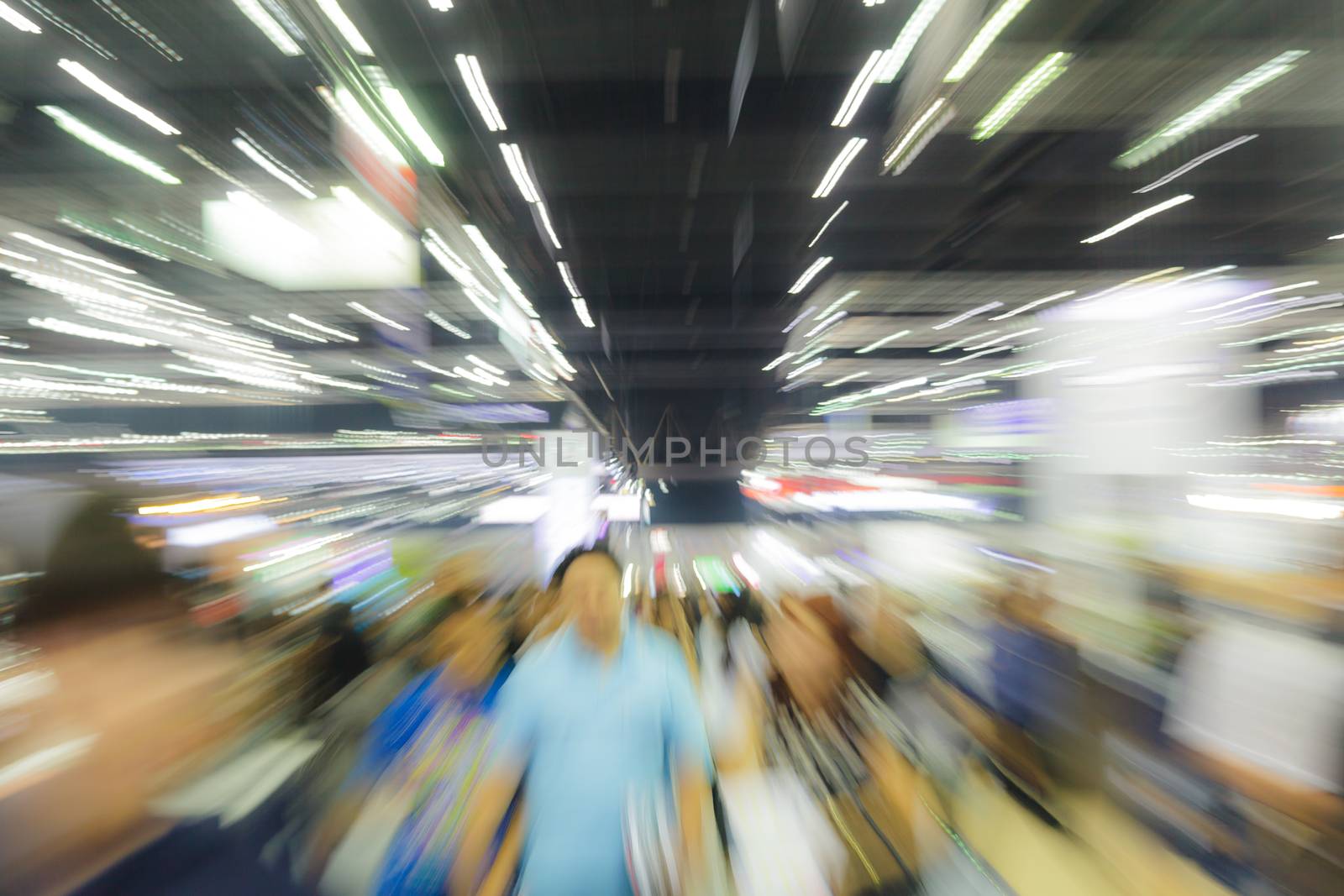 Blur image background of people in exhibition show by Naypong