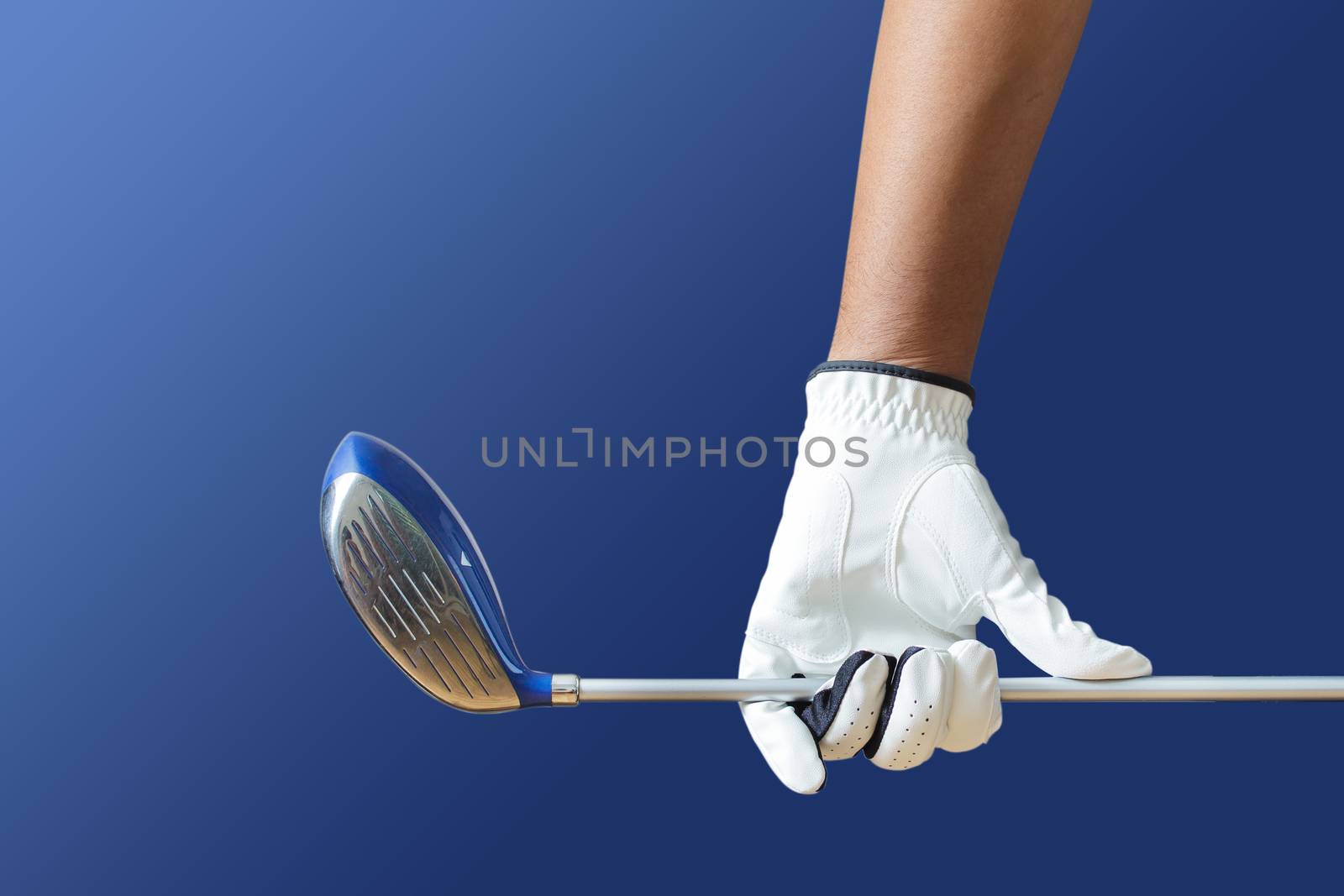 Golf player holding a golf club on a white background