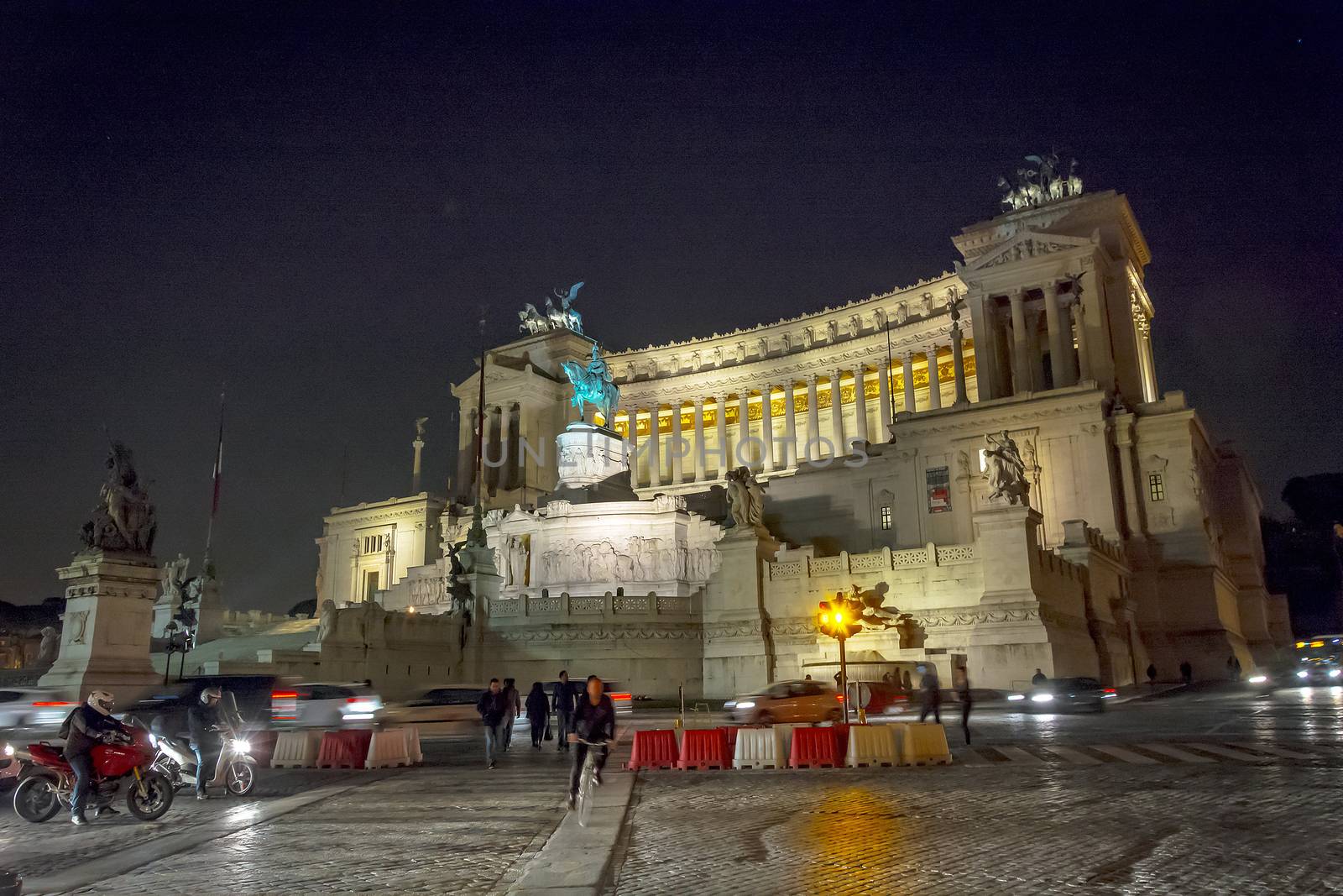 The National Monument to Victor Emmanuel II King of Italy shot at night in Rome, Italy