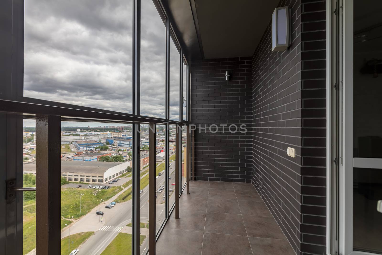 Small balcony interior in modern apartment building