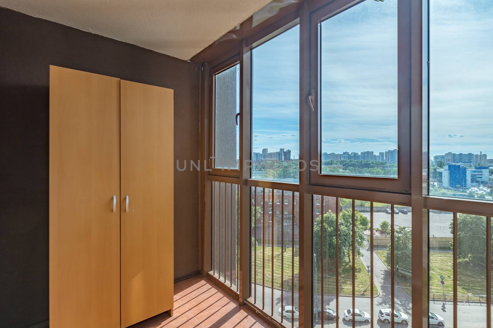 Small balcony interior in modern apartment building